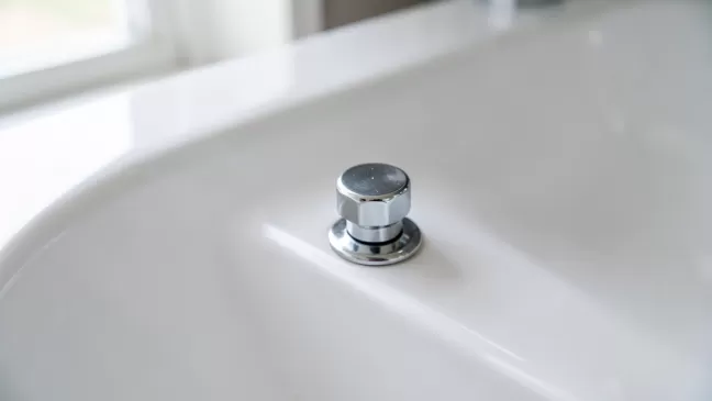 jak zamontować korek klik klak w umywalce